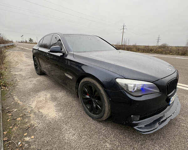 Синій БМВ 7 Серія, об'ємом двигуна 3 л та пробігом 288 тис. км за 13000 $, фото 1 на Automoto.ua