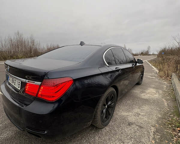Синій БМВ 7 Серія, об'ємом двигуна 3 л та пробігом 288 тис. км за 13000 $, фото 2 на Automoto.ua