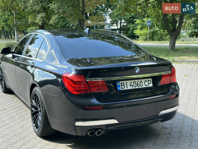 Синий БМВ 7 Серия, объемом двигателя 3 л и пробегом 197 тыс. км за 12500 $, фото 4 на Automoto.ua