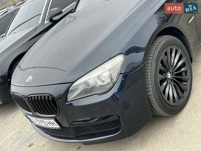 Синий БМВ 7 Серия, объемом двигателя 3 л и пробегом 168 тыс. км за 14999 $, фото 3 на Automoto.ua