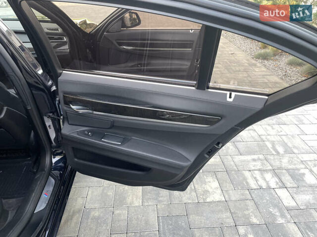 Синий БМВ 7 Серия, объемом двигателя 2.98 л и пробегом 190 тыс. км за 17800 $, фото 17 на Automoto.ua