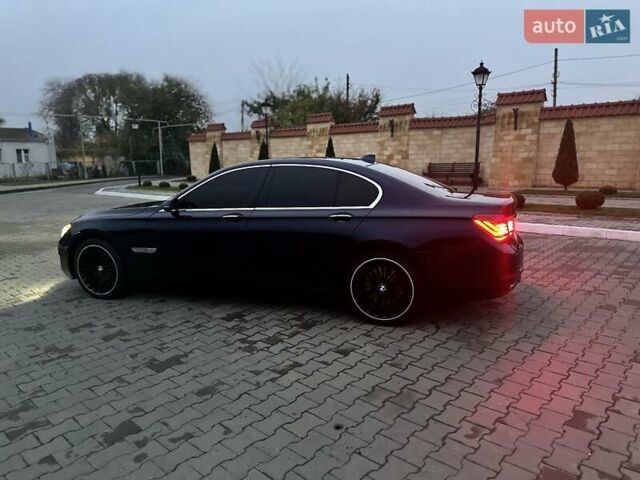 Синий БМВ 7 Серия, объемом двигателя 3 л и пробегом 309 тыс. км за 17000 $, фото 4 на Automoto.ua
