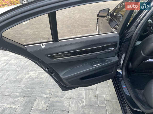 Синий БМВ 7 Серия, объемом двигателя 2.98 л и пробегом 190 тыс. км за 17800 $, фото 18 на Automoto.ua