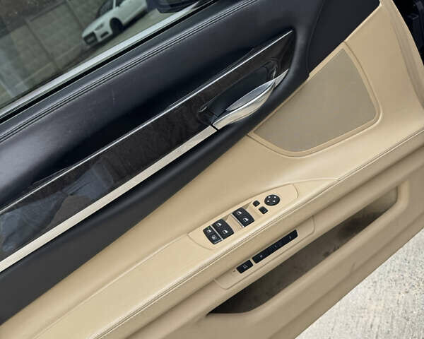 Синий БМВ 7 Серия, объемом двигателя 3 л и пробегом 299 тыс. км за 17900 $, фото 18 на Automoto.ua