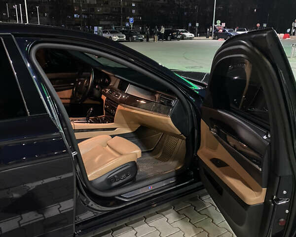 Синий БМВ 7 Серия, объемом двигателя 4.39 л и пробегом 153 тыс. км за 16800 $, фото 3 на Automoto.ua