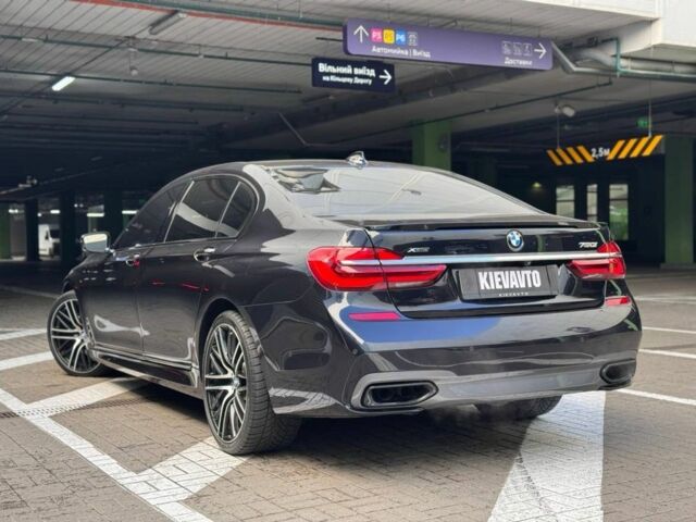 Синий БМВ 7 Серия, объемом двигателя 4.4 л и пробегом 134 тыс. км за 28500 $, фото 2 на Automoto.ua