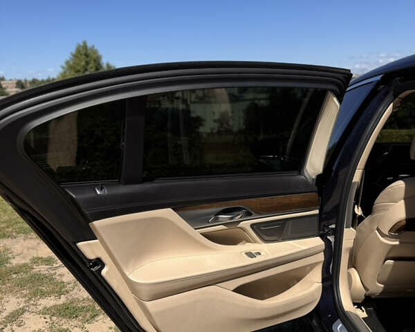 Синій БМВ 7 Серія, об'ємом двигуна 3 л та пробігом 81 тис. км за 36000 $, фото 12 на Automoto.ua