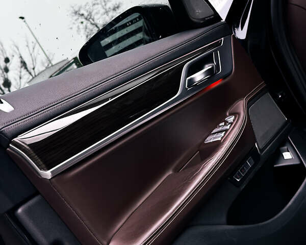 Синий БМВ 7 Серия, объемом двигателя 2.99 л и пробегом 189 тыс. км за 32500 $, фото 24 на Automoto.ua