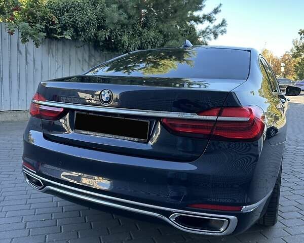 Синий БМВ 7 Серия, объемом двигателя 2.99 л и пробегом 105 тыс. км за 58000 $, фото 11 на Automoto.ua