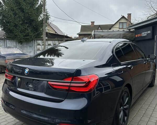 Синій БМВ 7 Серія, об'ємом двигуна 3 л та пробігом 190 тис. км за 23300 $, фото 13 на Automoto.ua