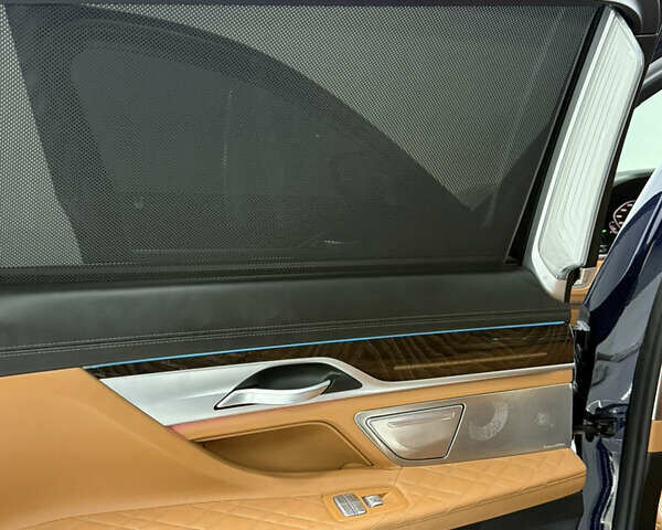 Синий БМВ 7 Серия, объемом двигателя 4.4 л и пробегом 67 тыс. км за 75000 $, фото 22 на Automoto.ua