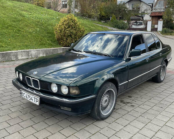 Зеленый БМВ 7 Серия, объемом двигателя 3 л и пробегом 386 тыс. км за 2600 $, фото 2 на Automoto.ua