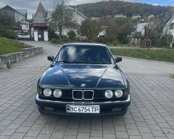 Зеленый БМВ 7 Серия, объемом двигателя 3 л и пробегом 386 тыс. км за 2600 $, фото 1 на Automoto.ua