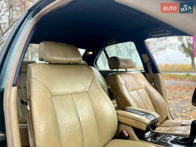 Зелений БМВ 7 Серія, об'ємом двигуна 2.5 л та пробігом 375 тис. км за 4555 $, фото 56 на Automoto.ua