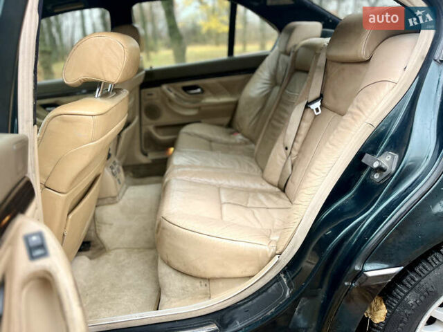 Зелений БМВ 7 Серія, об'ємом двигуна 2.5 л та пробігом 375 тис. км за 4555 $, фото 37 на Automoto.ua