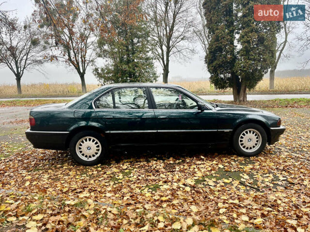 Зелений БМВ 7 Серія, об'ємом двигуна 2.5 л та пробігом 375 тис. км за 4555 $, фото 21 на Automoto.ua