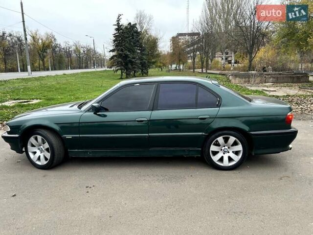 Зеленый БМВ 7 Серия, объемом двигателя 3.5 л и пробегом 475 тыс. км за 3400 $, фото 4 на Automoto.ua