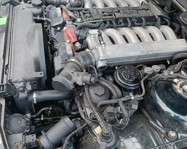 Зеленый БМВ 7 Серия, объемом двигателя 5.4 л и пробегом 517 тыс. км за 8000 $, фото 32 на Automoto.ua