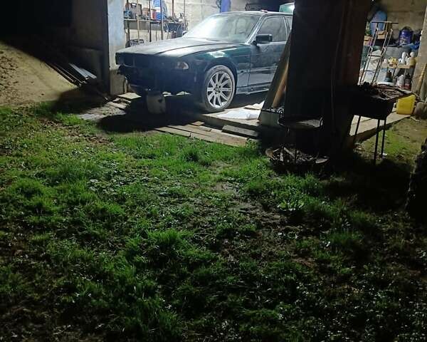 Зеленый БМВ 7 Серия, объемом двигателя 5.4 л и пробегом 517 тыс. км за 8000 $, фото 25 на Automoto.ua