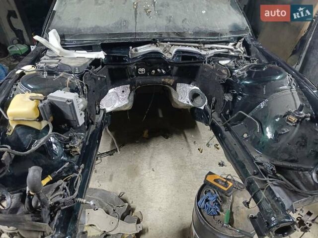 Зеленый БМВ 7 Серия, объемом двигателя 5.4 л и пробегом 517 тыс. км за 8000 $, фото 16 на Automoto.ua