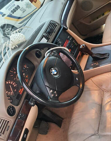 Зеленый БМВ 7 Серия, объемом двигателя 3 л и пробегом 450 тыс. км за 5700 $, фото 6 на Automoto.ua