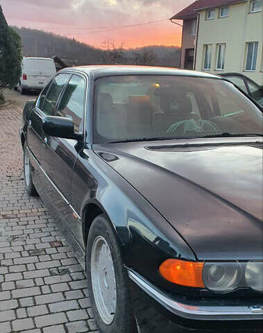 Зеленый БМВ 7 Серия, объемом двигателя 3 л и пробегом 450 тыс. км за 5700 $, фото 10 на Automoto.ua