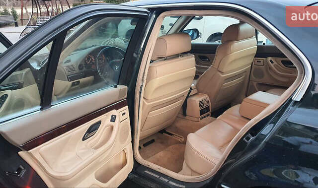 Зеленый БМВ 7 Серия, объемом двигателя 3 л и пробегом 450 тыс. км за 5700 $, фото 13 на Automoto.ua