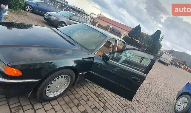 Зеленый БМВ 7 Серия, объемом двигателя 3 л и пробегом 450 тыс. км за 5700 $, фото 9 на Automoto.ua