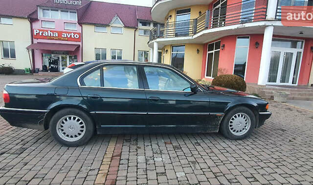 Зеленый БМВ 7 Серия, объемом двигателя 3 л и пробегом 450 тыс. км за 5700 $, фото 15 на Automoto.ua