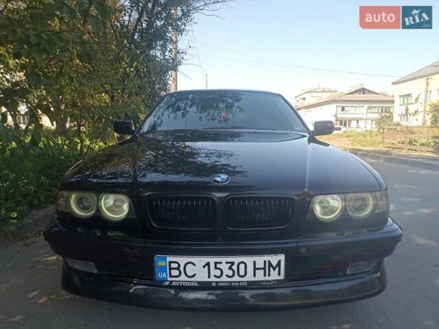Чорний БМВ 740, об'ємом двигуна 3.9 л та пробігом 296 тис. км за 8000 $, фото 2 на Automoto.ua