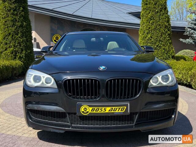 Чорний БМВ 740, об'ємом двигуна 3 л та пробігом 250 тис. км за 15400 $, фото 1 на Automoto.ua