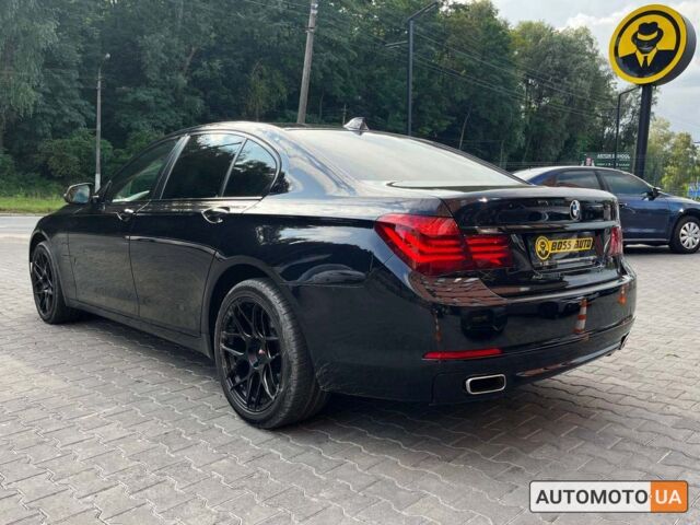 Чорний БМВ 740, об'ємом двигуна 3 л та пробігом 205 тис. км за 24800 $, фото 4 на Automoto.ua