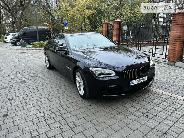 Чорний БМВ 740, об'ємом двигуна 3 л та пробігом 135 тис. км за 25000 $, фото 1 на Automoto.ua