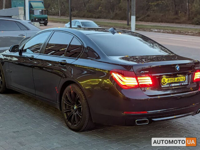 Чорний БМВ 740, об'ємом двигуна 3 л та пробігом 212 тис. км за 24600 $, фото 3 на Automoto.ua