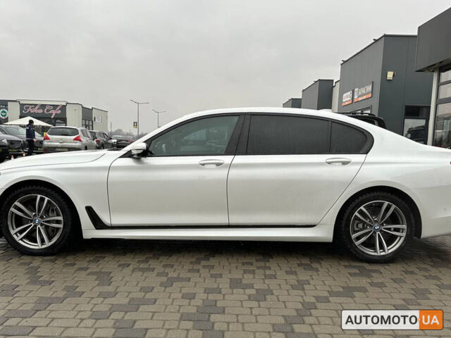 Білий БМВ 750, об'ємом двигуна 4.4 л та пробігом 45 тис. км за 41000 $, фото 3 на Automoto.ua