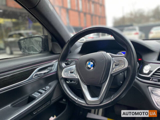 Серый БМВ 750, объемом двигателя 4.4 л и пробегом 107 тыс. км за 32000 $, фото 10 на Automoto.ua