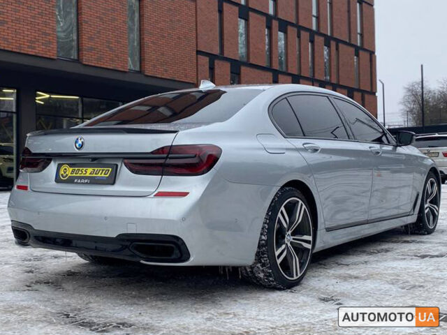 Серый БМВ 750, объемом двигателя 4.4 л и пробегом 107 тыс. км за 32000 $, фото 5 на Automoto.ua