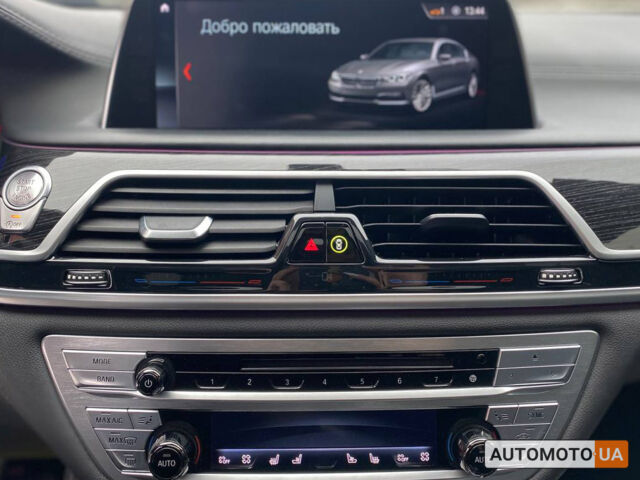 Серый БМВ 750, объемом двигателя 4.4 л и пробегом 107 тыс. км за 32000 $, фото 14 на Automoto.ua