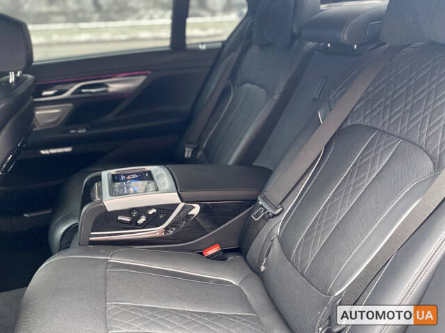 Серый БМВ 750, объемом двигателя 4.4 л и пробегом 107 тыс. км за 32000 $, фото 19 на Automoto.ua