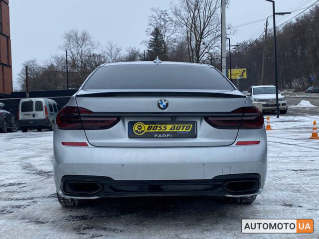 Серый БМВ 750, объемом двигателя 4.4 л и пробегом 107 тыс. км за 32000 $, фото 4 на Automoto.ua