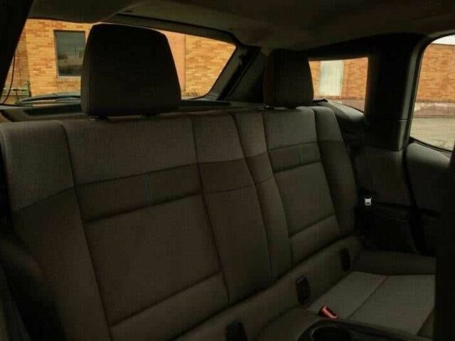 Красный БМВ И3, объемом двигателя 0.7 л и пробегом 35 тыс. км за 6400 $, фото 16 на Automoto.ua