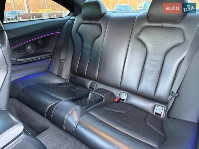 Черный БМВ M4, объемом двигателя 2.98 л и пробегом 148 тыс. км за 36990 $, фото 12 на Automoto.ua