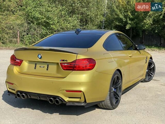 Желтый БМВ M4, объемом двигателя 2.98 л и пробегом 105 тыс. км за 44900 $, фото 3 на Automoto.ua