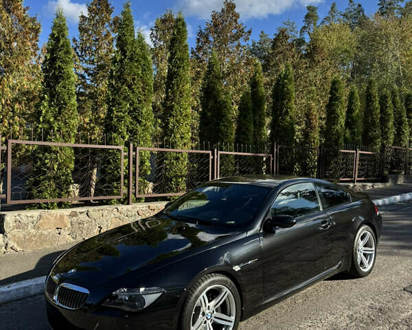 Черный БМВ М6, объемом двигателя 5 л и пробегом 125 тыс. км за 37500 $, фото 1 на Automoto.ua