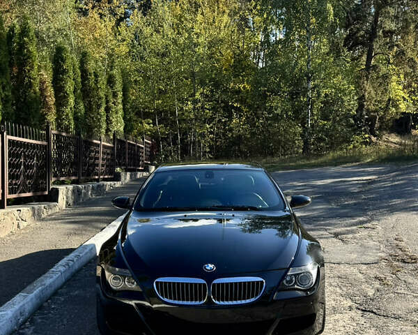 Черный БМВ М6, объемом двигателя 5 л и пробегом 125 тыс. км за 37500 $, фото 7 на Automoto.ua