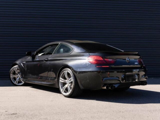 Черный БМВ М6, объемом двигателя 4.4 л и пробегом 77 тыс. км за 20500 $, фото 3 на Automoto.ua