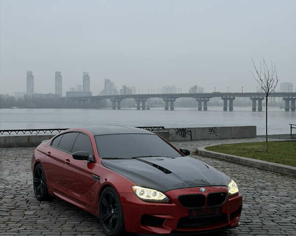Красный БМВ М6, объемом двигателя 4.39 л и пробегом 78 тыс. км за 36000 $, фото 1 на Automoto.ua