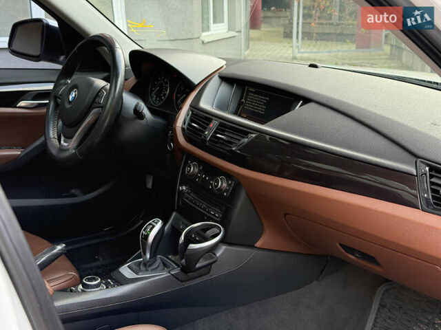 БМВ Х1 2012 в Львове на Automoto.ua Белый БМВ Х1, объемом двигателя 2 л и пробегом 169 тыс. км за 9200 $, фото 10 на Automoto.ua