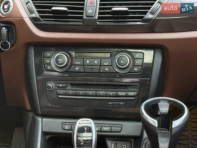 БМВ Х1 2012 в Львове на Automoto.ua Белый БМВ Х1, объемом двигателя 2 л и пробегом 169 тыс. км за 9200 $, фото 13 на Automoto.ua