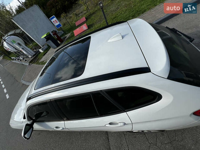 Білий БМВ Х1, об'ємом двигуна 2 л та пробігом 203 тис. км за 13100 $, фото 9 на Automoto.ua